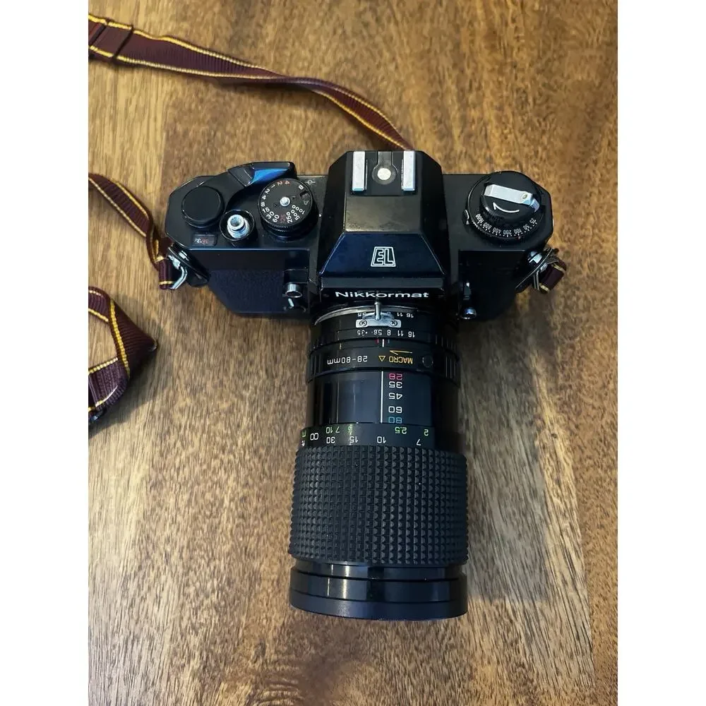 Nikon Black Camera with Brown Strap